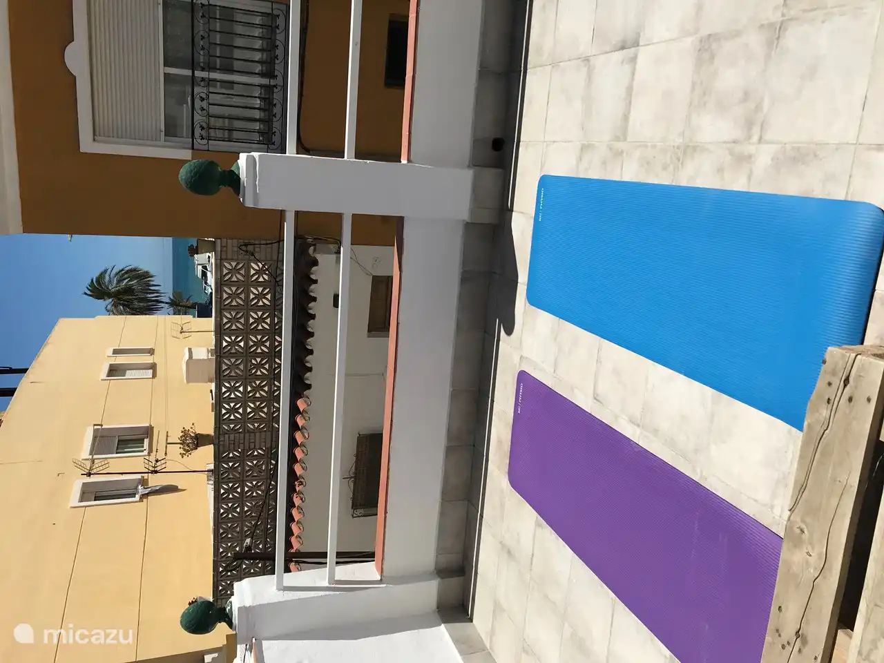Two yoga mats available. Feel free to use it to have a happy en relaxed stay. Perfect location is the roof terrace with seaview :)