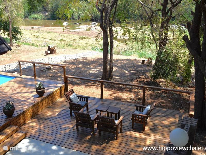 Holiday home in South Africa, Limpopo, Hoedspruit Bungalow Hippoview Chalet on river/ Krüger