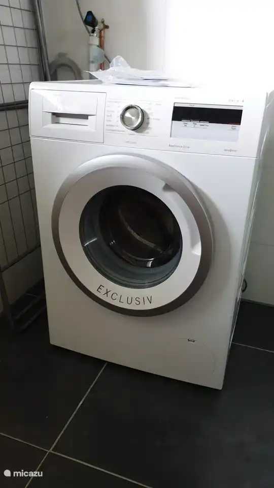 Wasmachine. Vakantiehuis Salland Huys, Heeten, Nederland.