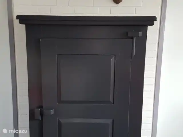 Vosseven 38 en Países Bajos, Limburgo, Stramproy - casa vacacional Los ciervos son el tema en toda la cabaña. En la antigua panera encontrarás la panera y los vasos.