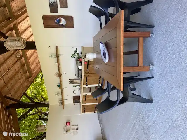 The outdoor kitchen by the pool