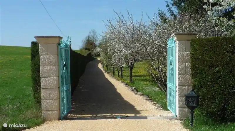 The property is accessed via the 100m. long driveway.