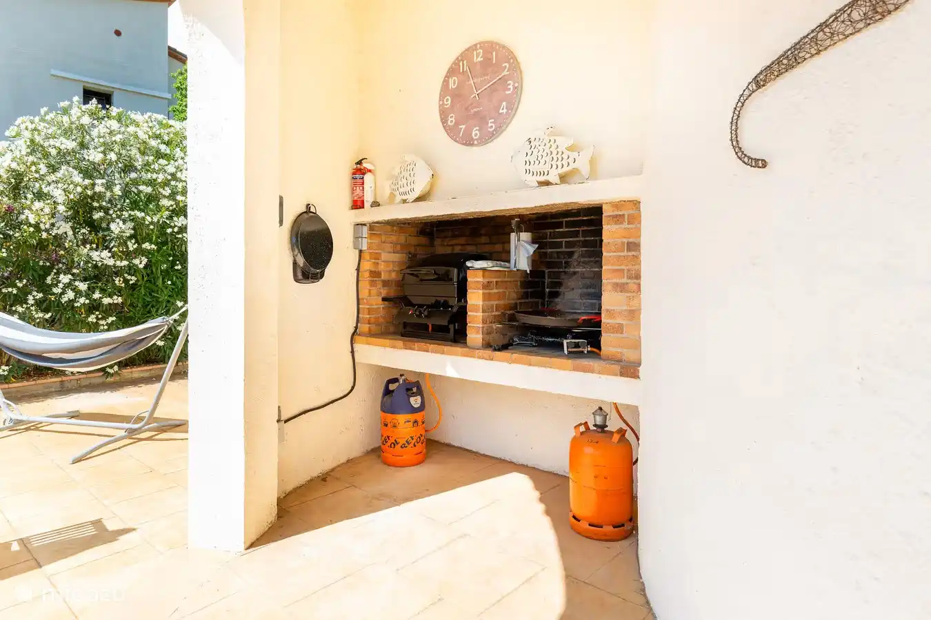 Outdoor kitchen. With its own chimney!