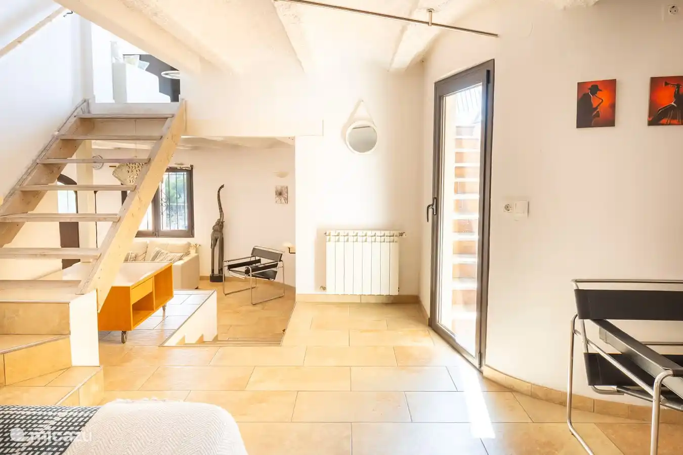 A staircase to living room