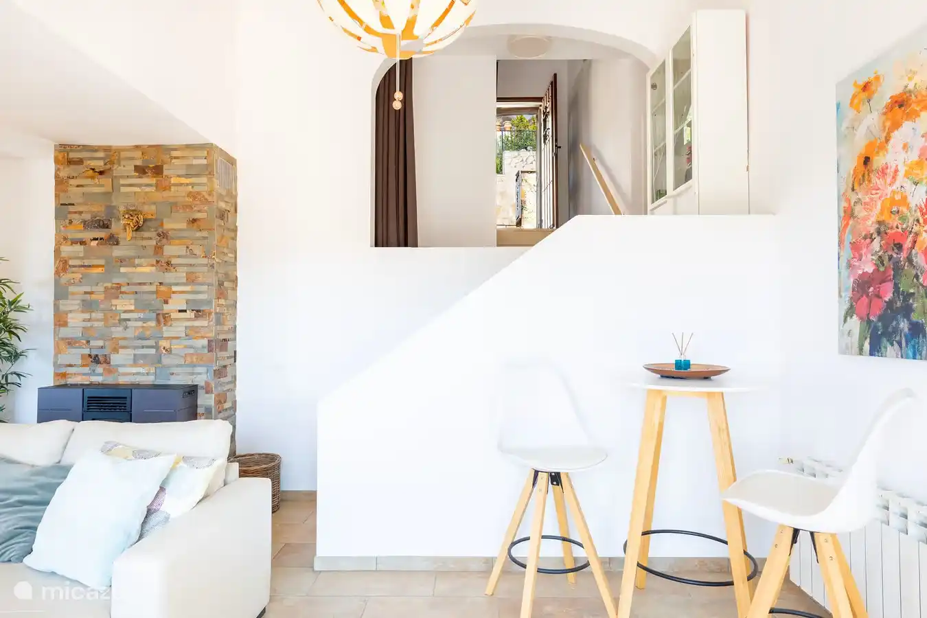 Work corner in living room open staircase to front door