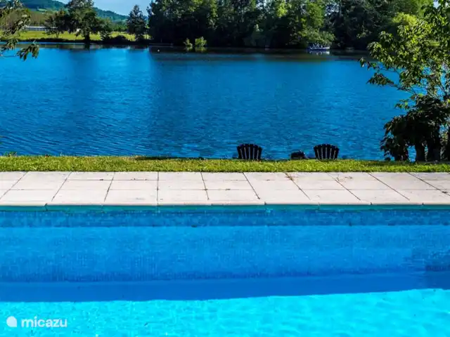 Location de Vacances France, Lot-et-Garonne, Le Temple-sur-Lot, gîte / cottage - Chez Jan et Nicole - Gîte Issac vue du bord de la piscine sur le Lot