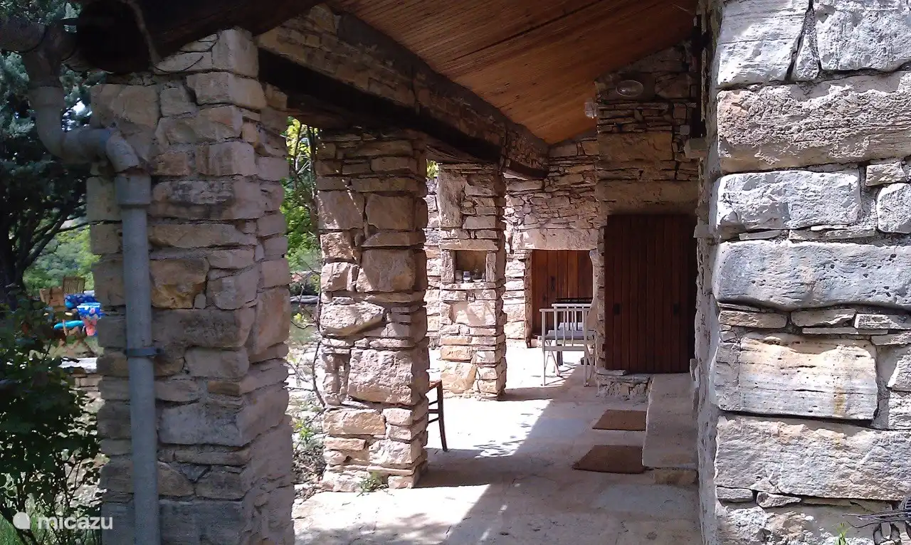 This is the covered porch that connects the rooms downstairs