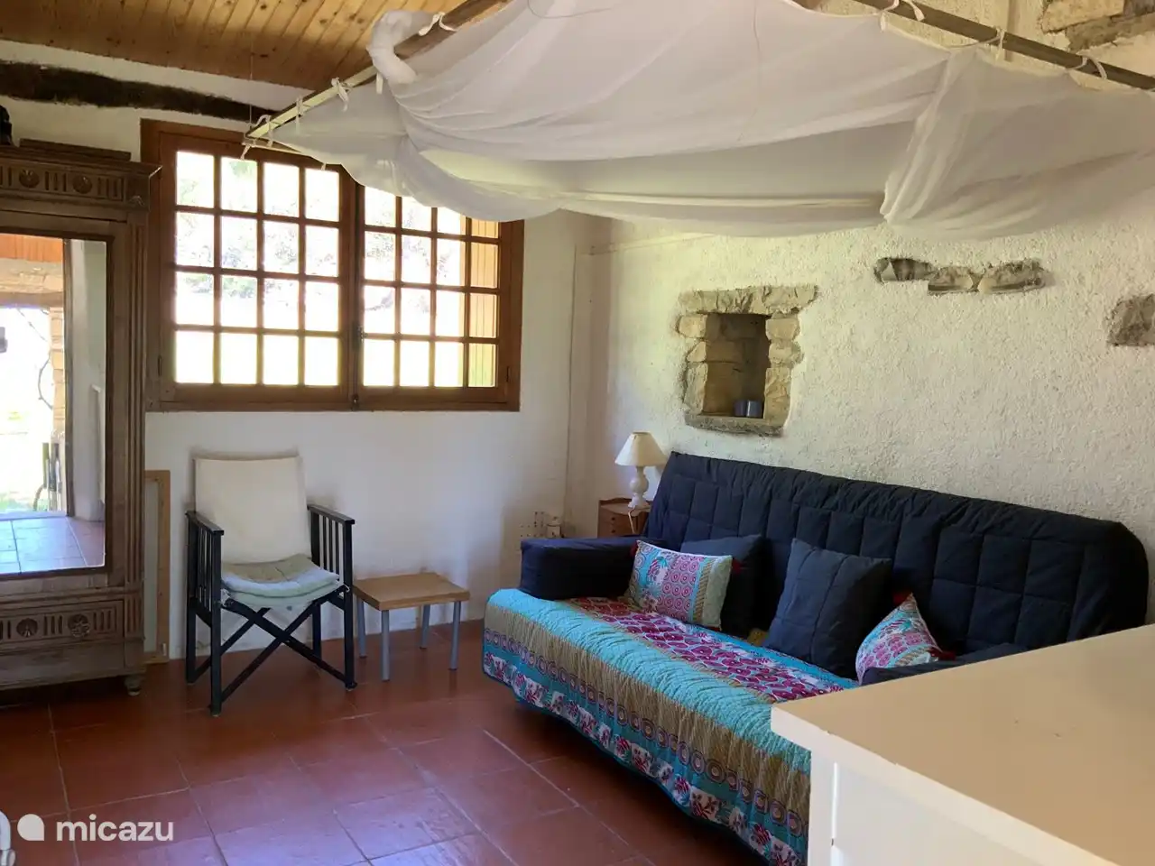 living room with folding bed