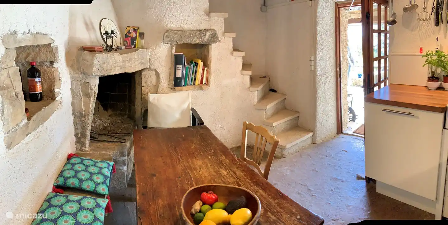 kitchen with stairs to bedroom