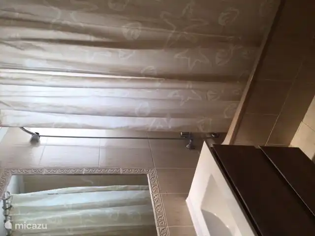 bathroom with small bath and shower 