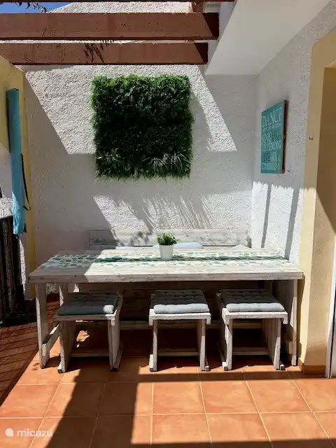Large dining table on terrace 