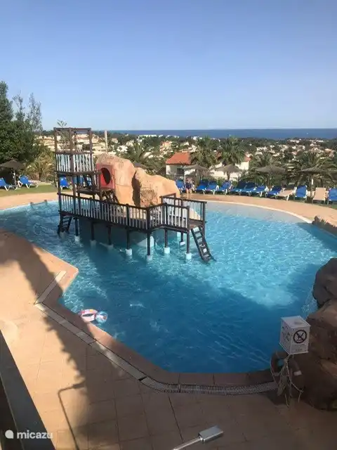 climbing frame in paddling pool 