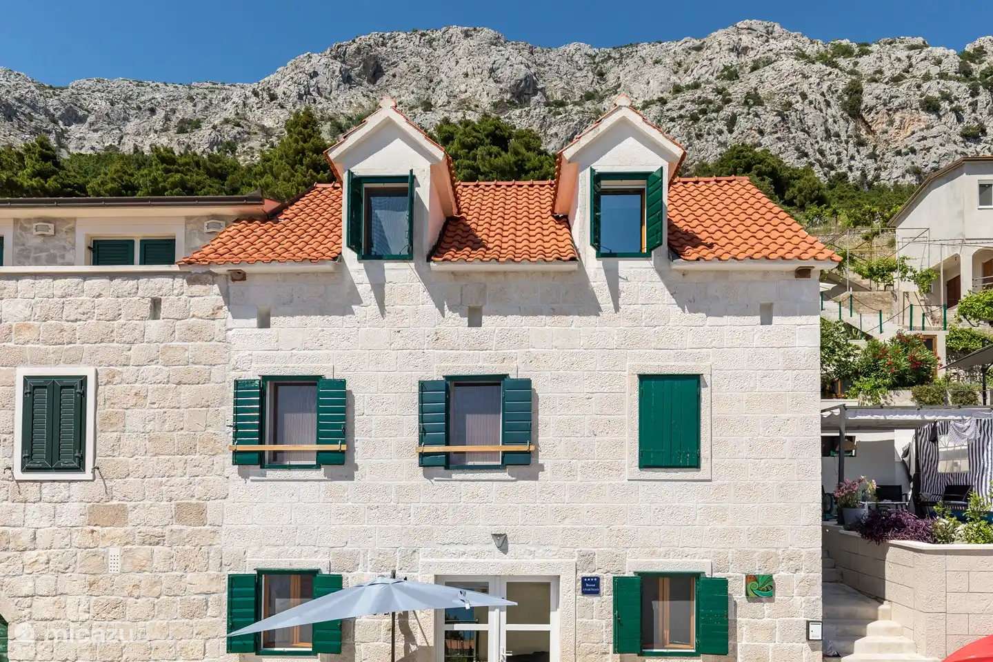 Front view of our old stone house