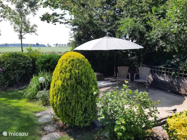 Weids uitzicht huren in Nederland, Zeeland, Ouwerkerk - bungalow Terras in de achtertuin