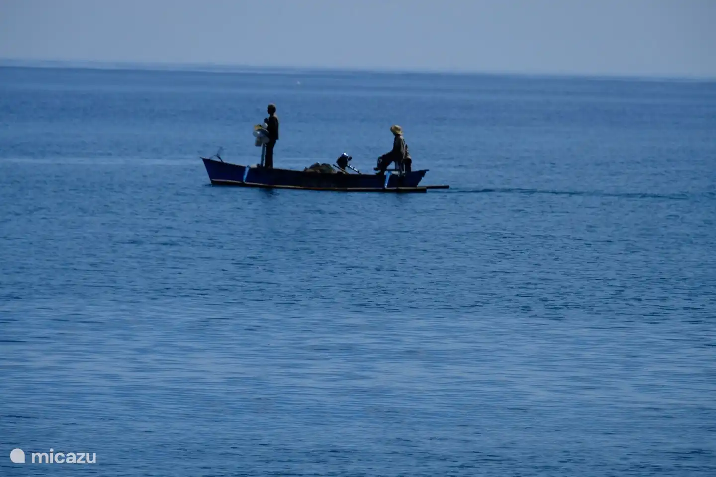 Pescadores en el agua