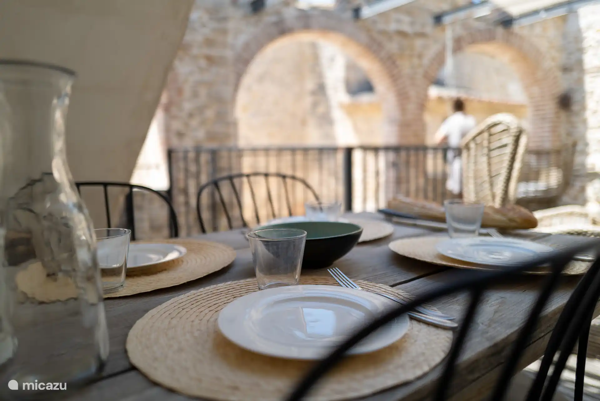 Terrace gîte Romarin with a view of the village square. Romarin is on the 1st floor.