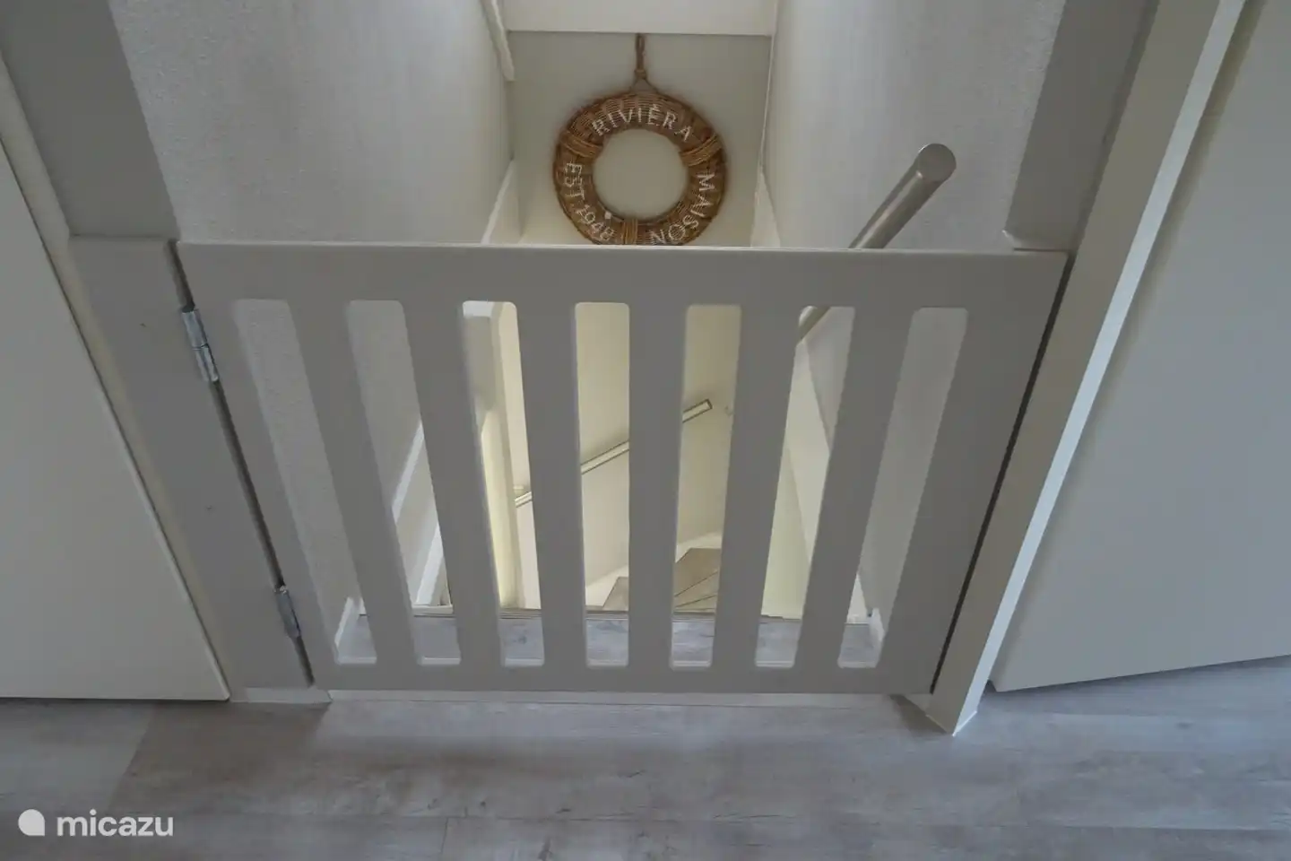 Landing with stair gate