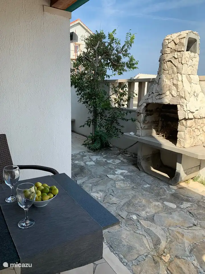 outside seating area with bbq