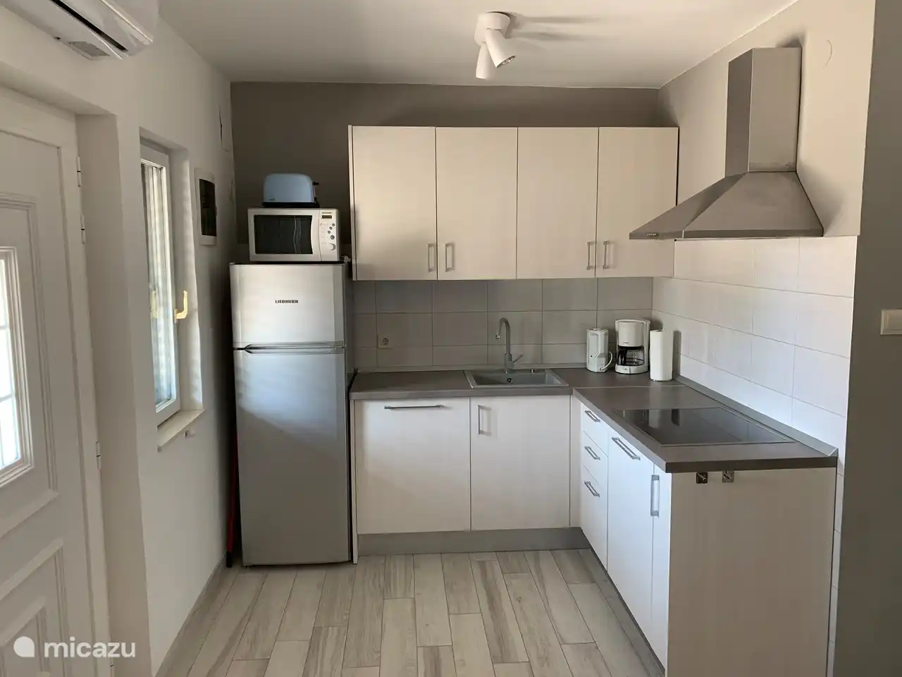 Villa Maral A1: kitchen with dishwasher and ceramic hob
