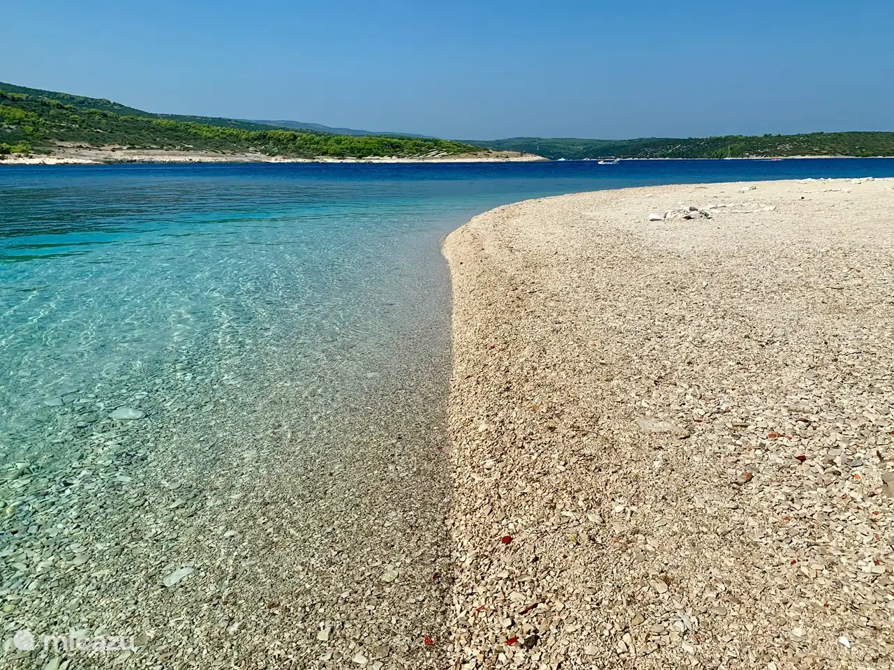 Beach around Villa Maral with various shady spots