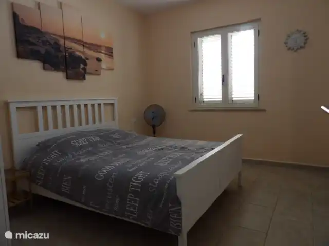Villa Tana Margianis | Italie, Sardaigne, Perdaxius - villa Chambre avec un lit double et salle de bain attenante