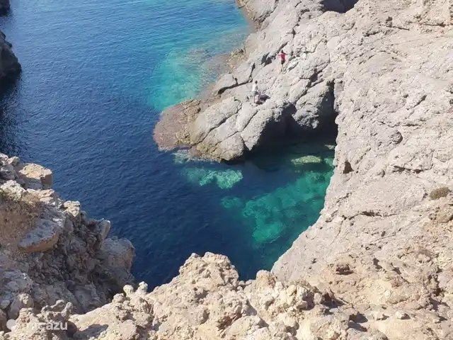 Villa Tana Margianis | Italie, Sardaigne, Perdaxius - villa Cala Grotte. Vous pouvez nager dans la grotte ici.