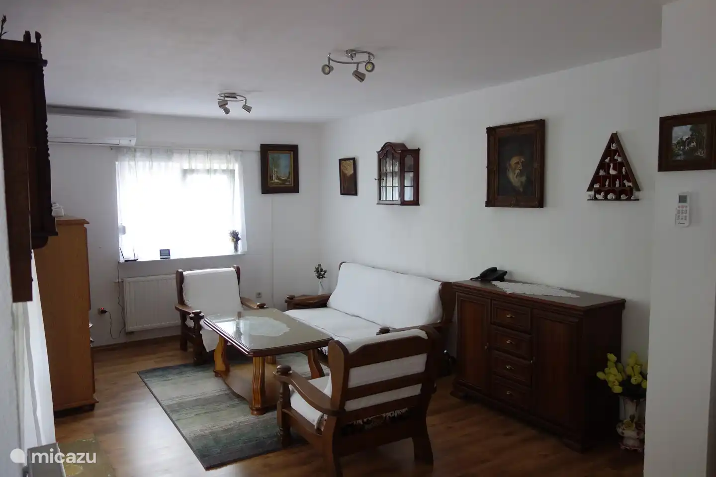Living room with air conditioning unit