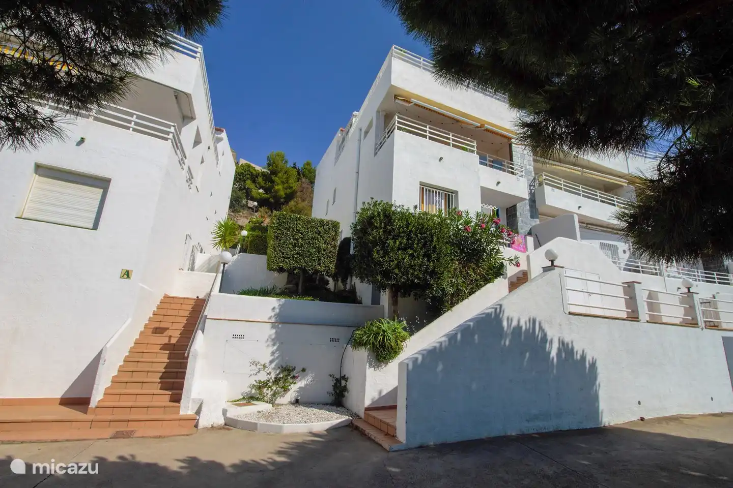 the apartment is accessible via stairs