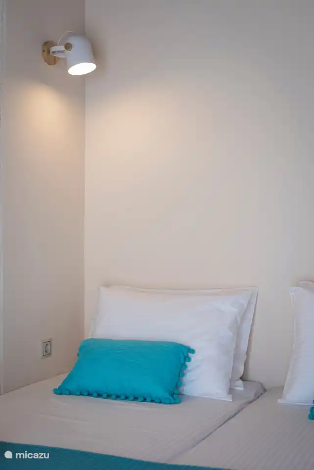 Smaller upstairs bedroom, adjacent to the small balcony