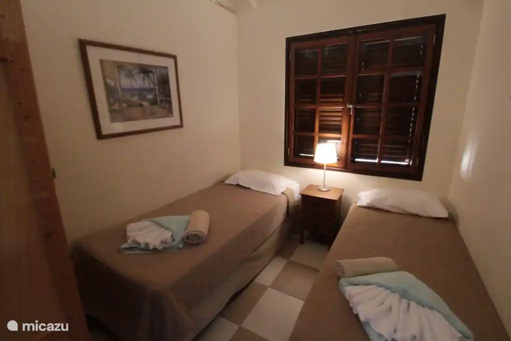 Third bedroom, again fitted wardrobes. Toilet next to this room.