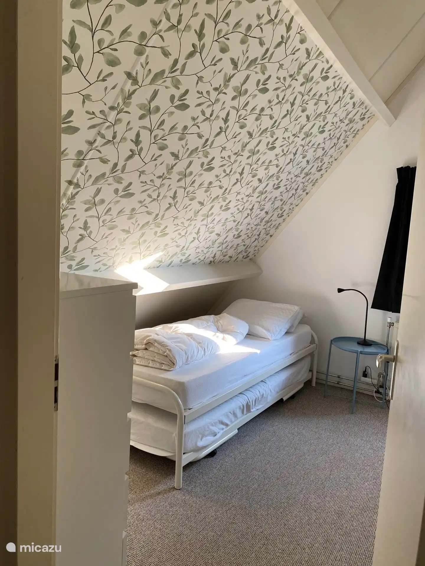 Das dritte Schlafzimmer mit Doppelbett hat auch zwei separate Betten.