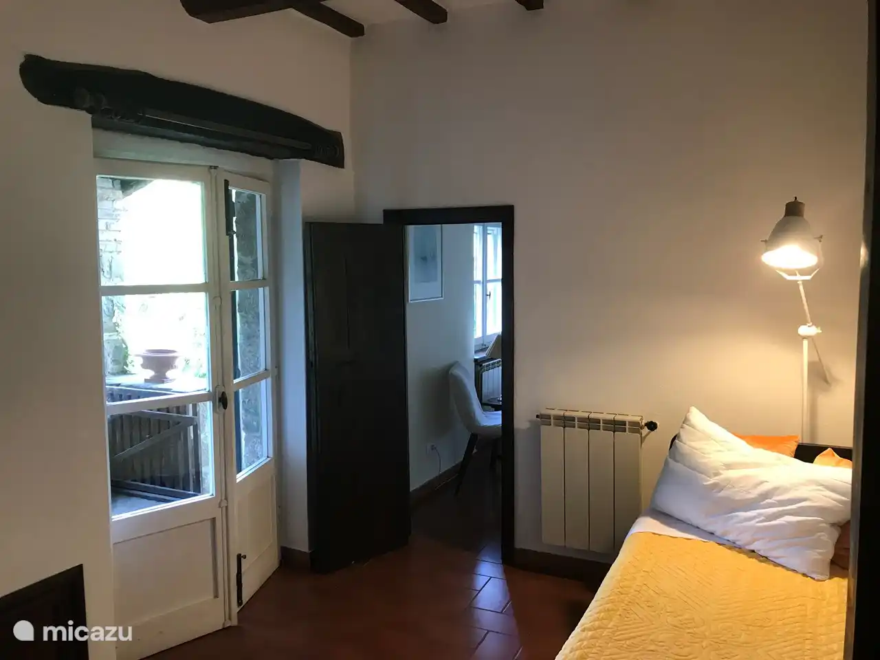 De derde slaapkamer met toegang naar balkon en tweede slaapkamer