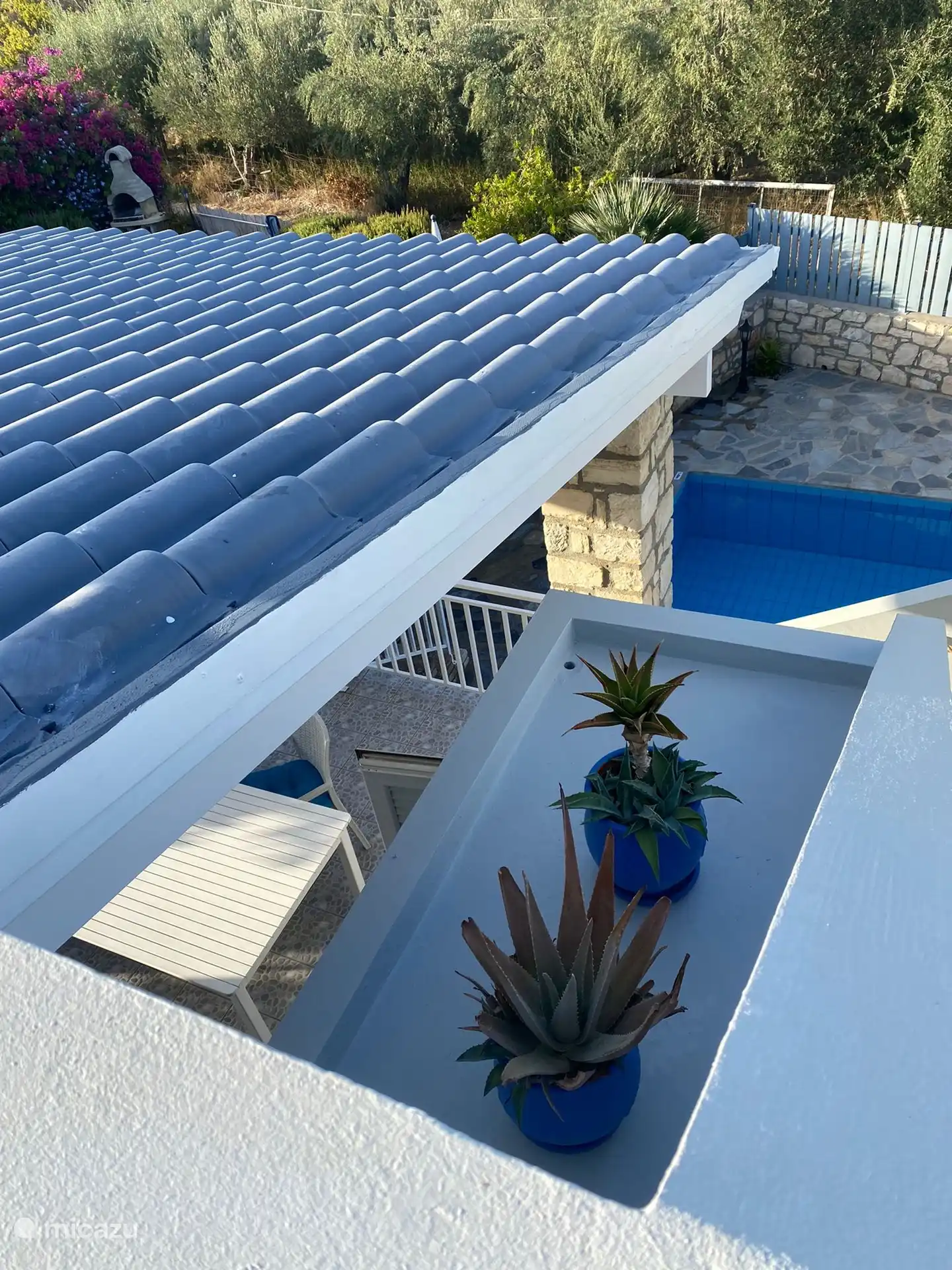 You will encounter these two on your way to the roof terrace.