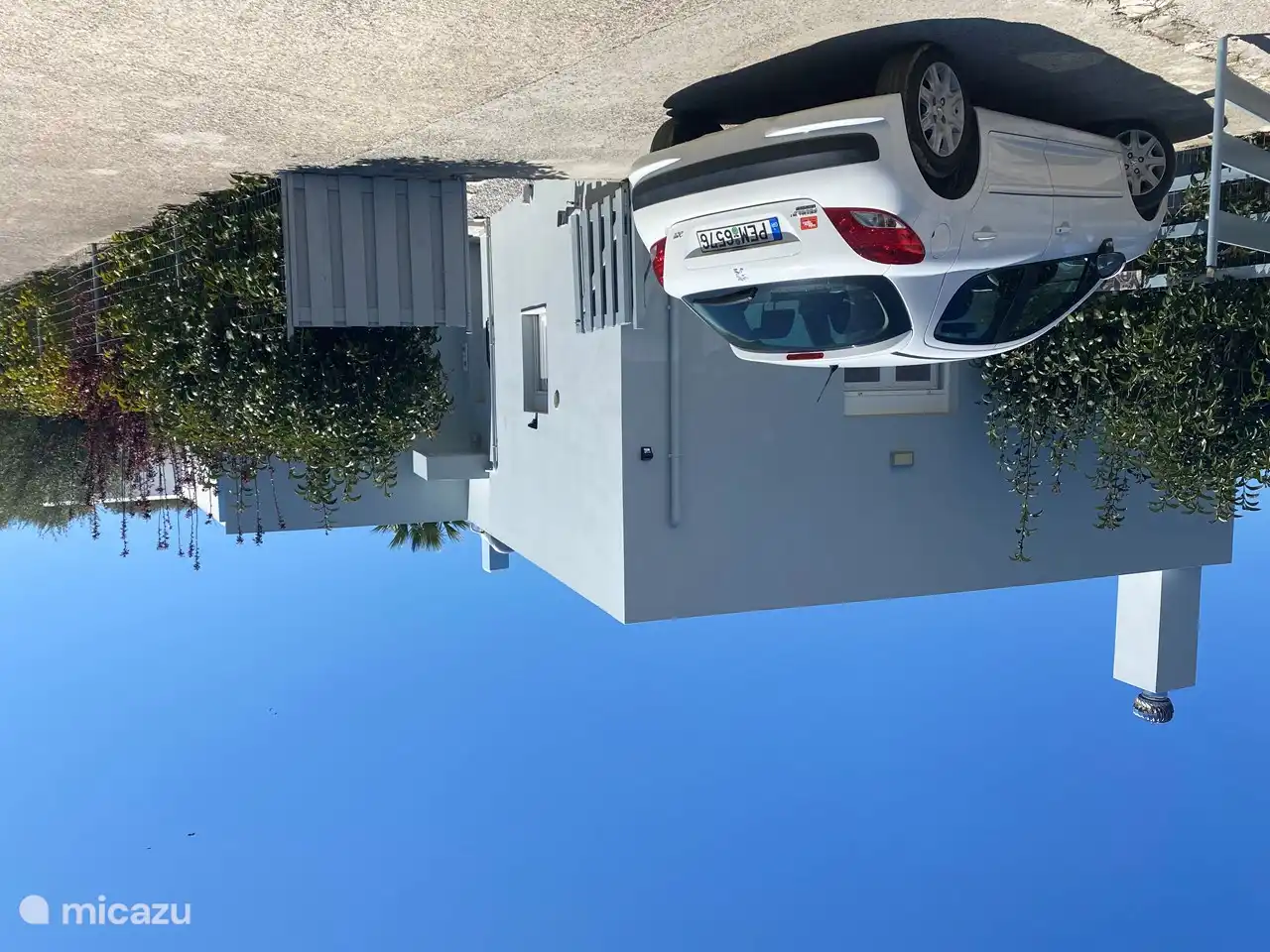 Access to the front door, through the front garden you can walk around the entire house.