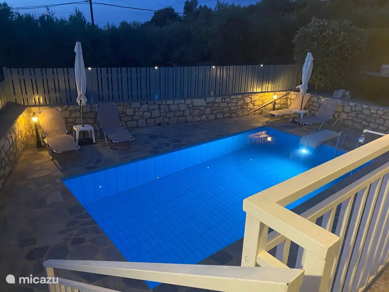 Evening lighting swimming pool.