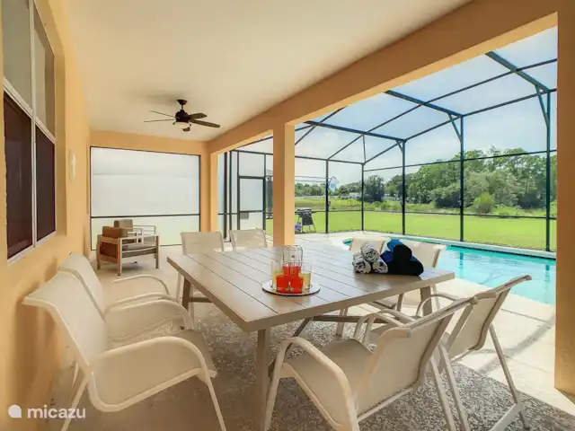 Villa Majeure | États-Unis, Floride, Davenport - villa Vaste véranda avec coin repas et salon