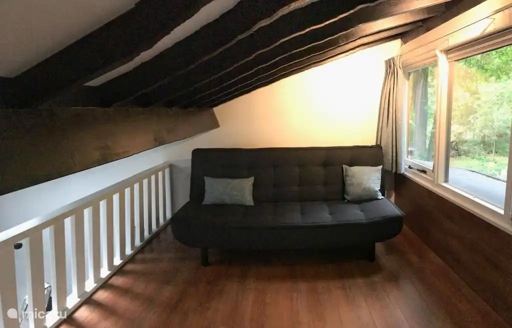 Slaapkamer 3 met slaapbank op vide