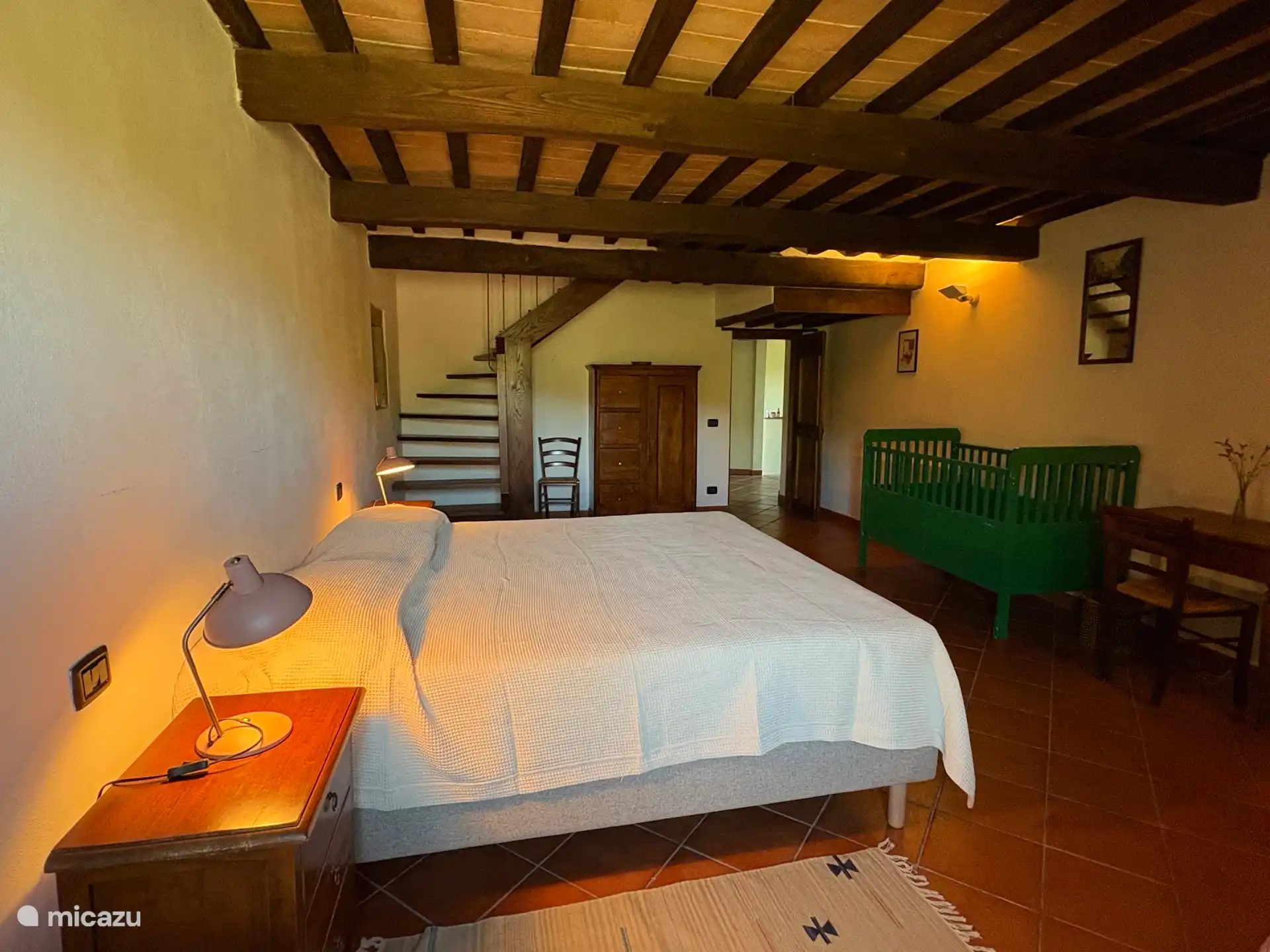 Bedroom 1 with stairs to private bathroom