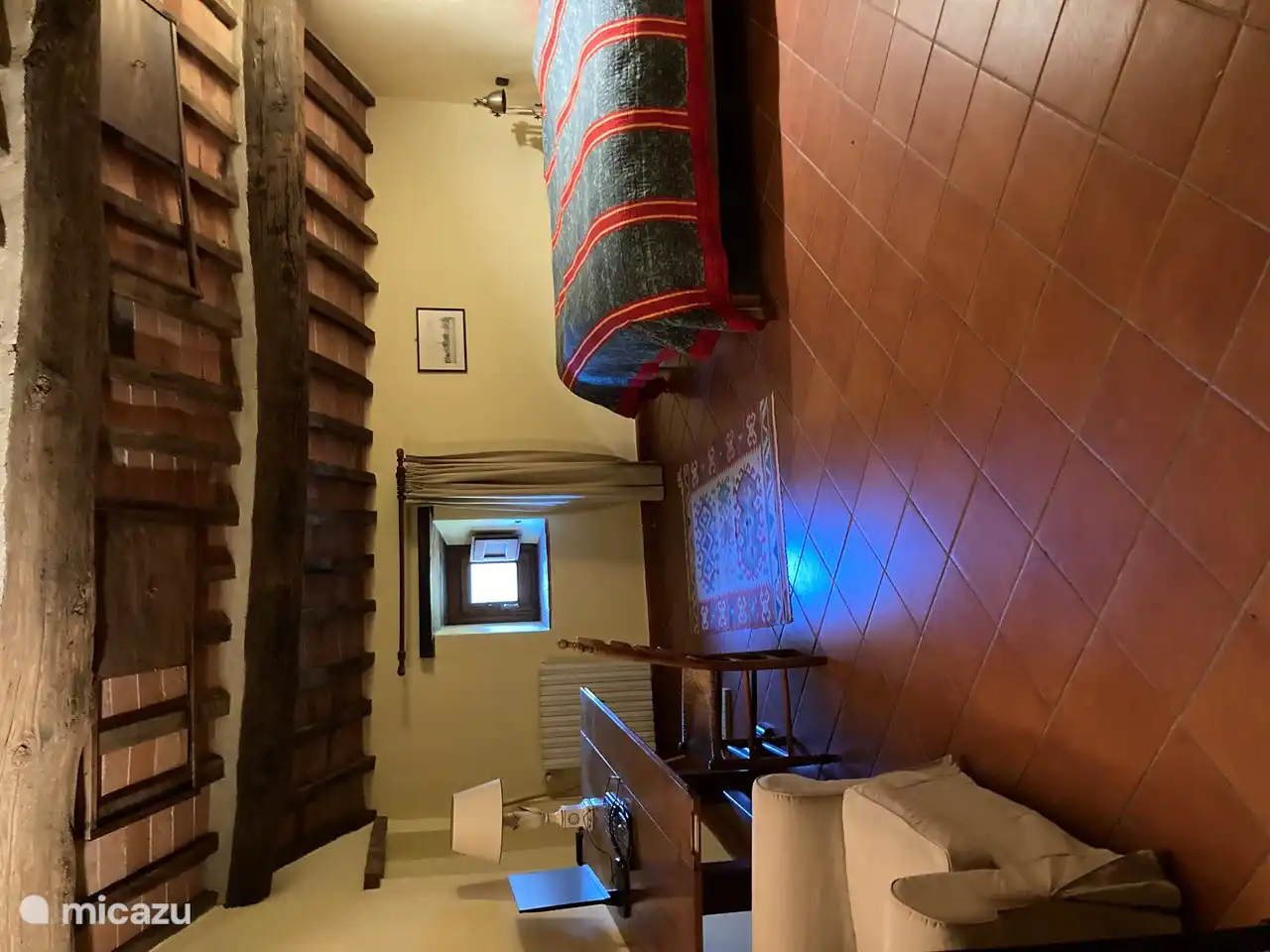 Bedroom 3 on the east with a double bed (180 x 200 cm) and two single beds on loft. Private bathroom