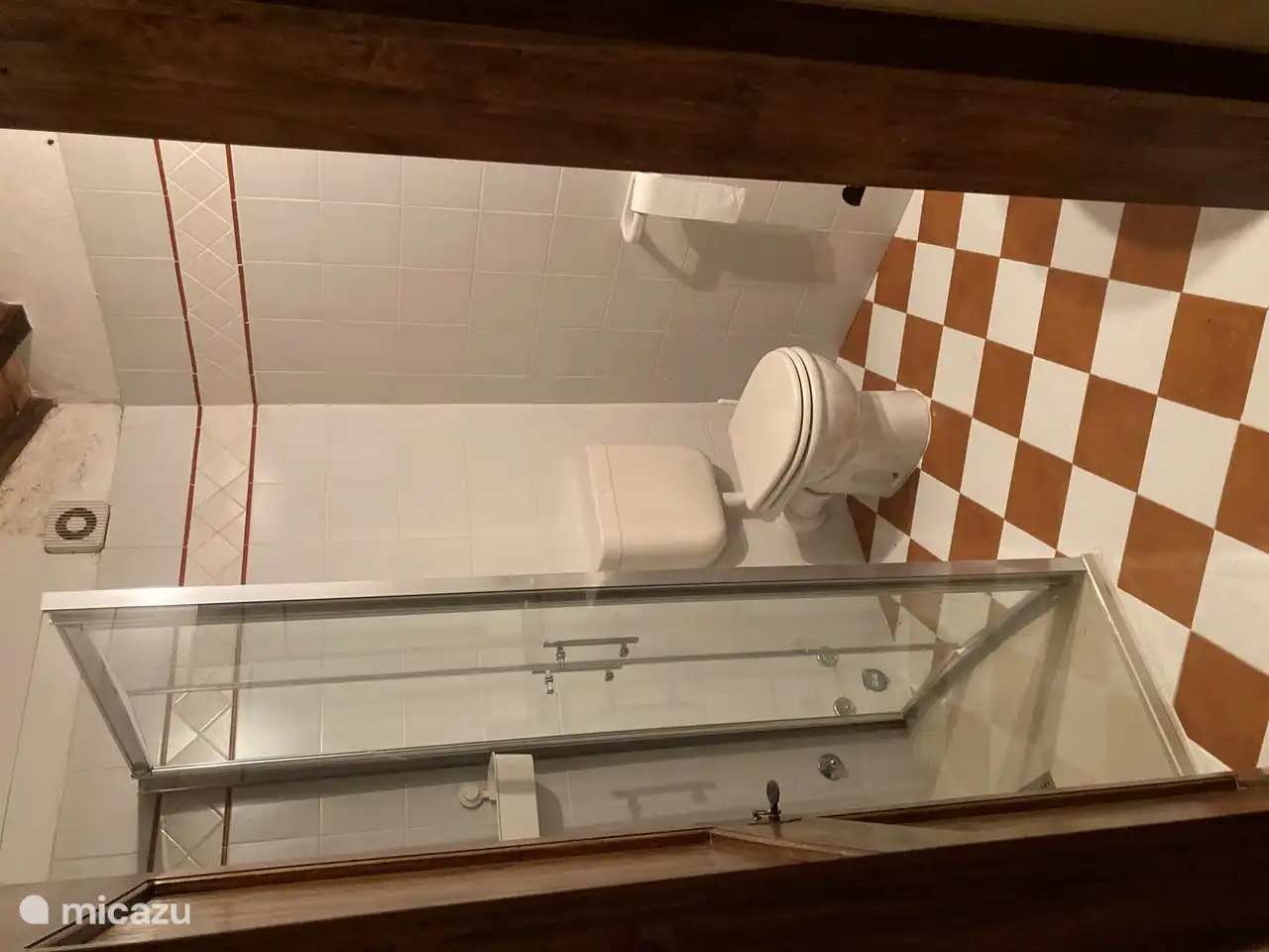 Bathroom in bedroom 4 with rain shower, toilet and sink