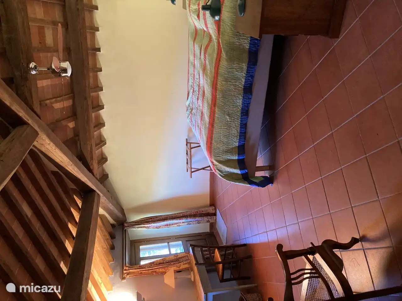 Bedroom 6 facing north with double bed (180 x 200 cm). Private bathroom. Down the stairs