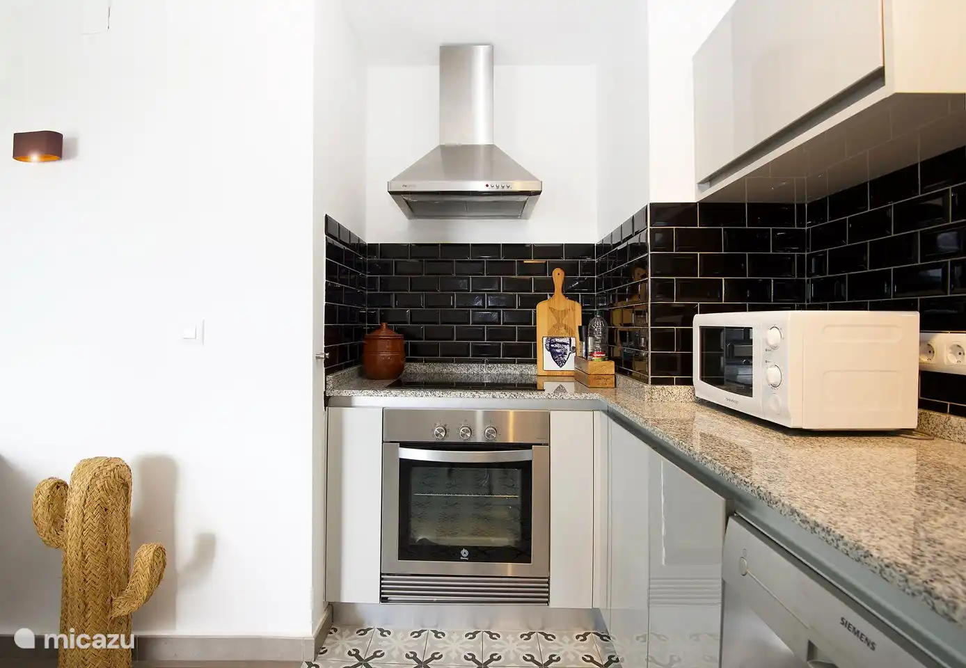 Complete kitchen with oven and microwave