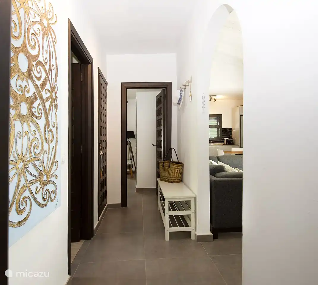 The corridor with the typical Spanish wooden doors