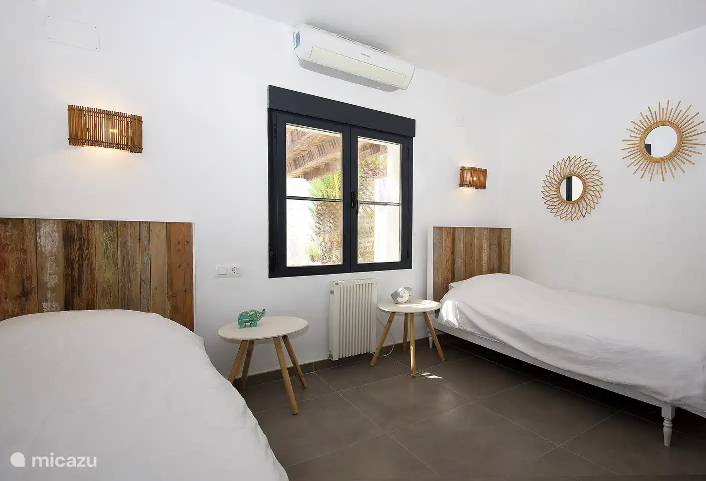 The first double bedroom, with air conditioning and hor