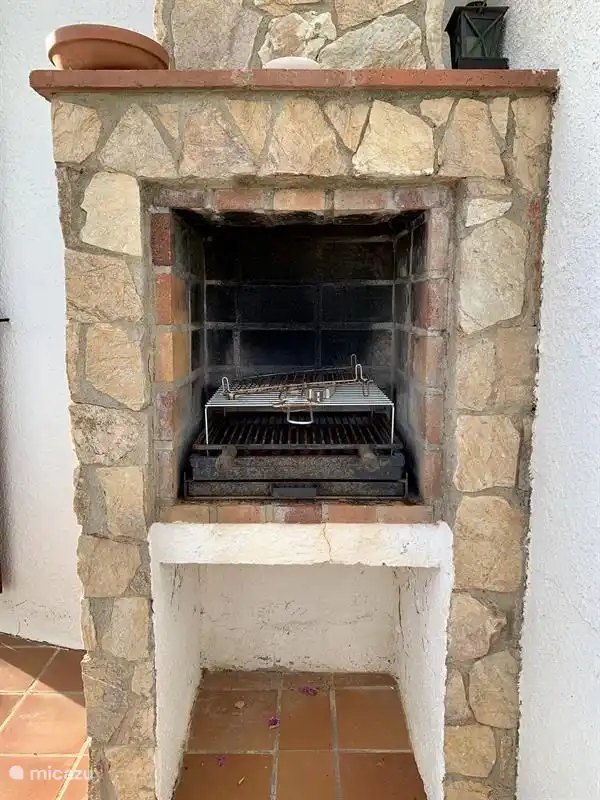 BBQ on terrace at living / dining room