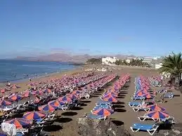 The large beach is a 5 minute walk from the villla