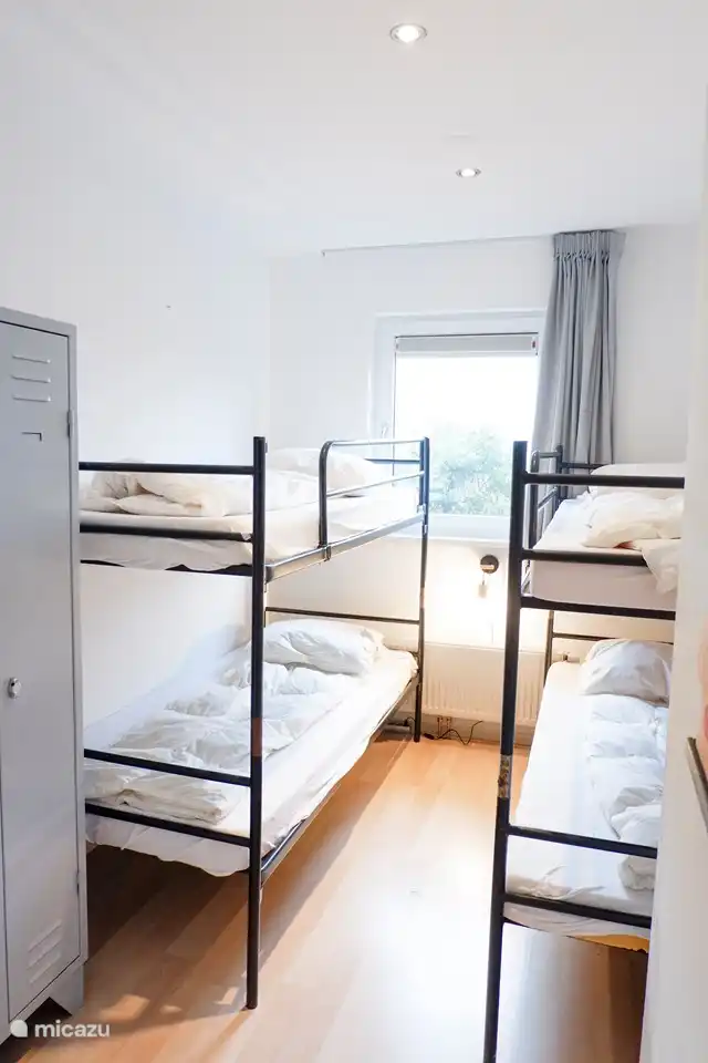 Ein gemütliches Zimmer für die Kinder mit stundenlangem Spiel- und Schlafspaß auf den Etagenbetten.