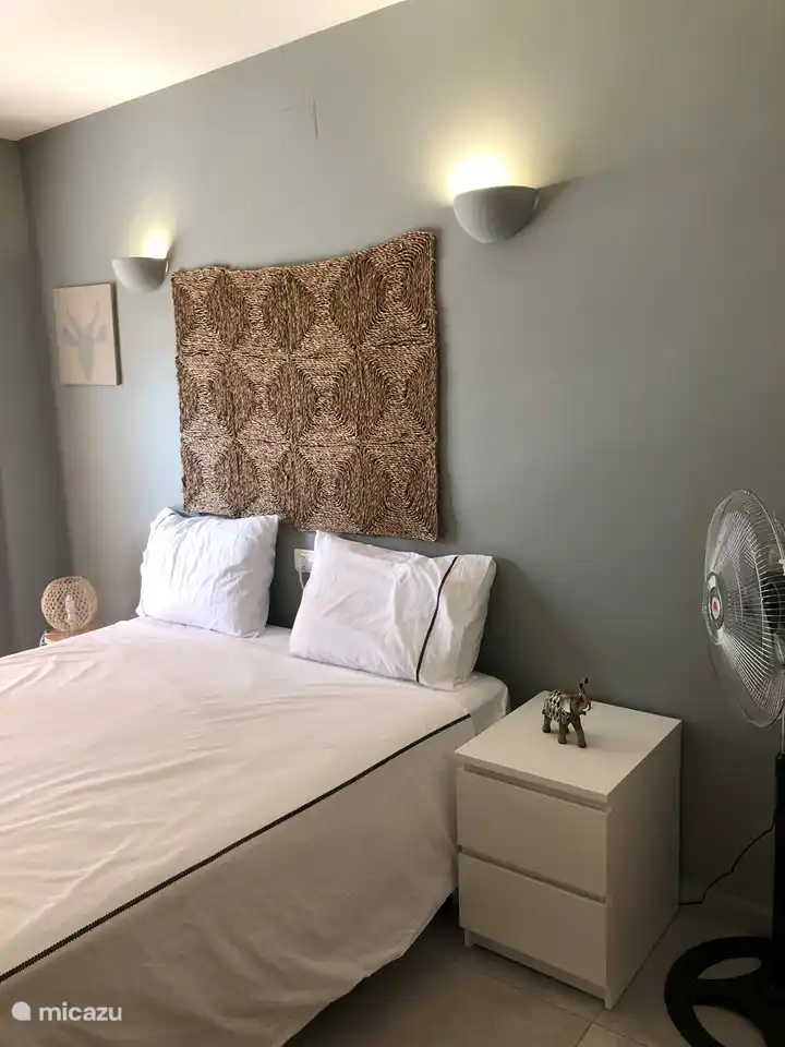 Bedroom 1 is spacious and light and can be darkened with shutters