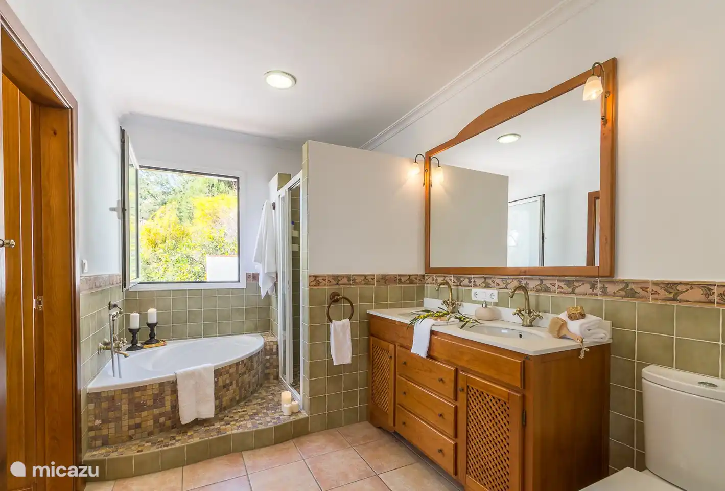 Bathroom with corner bath