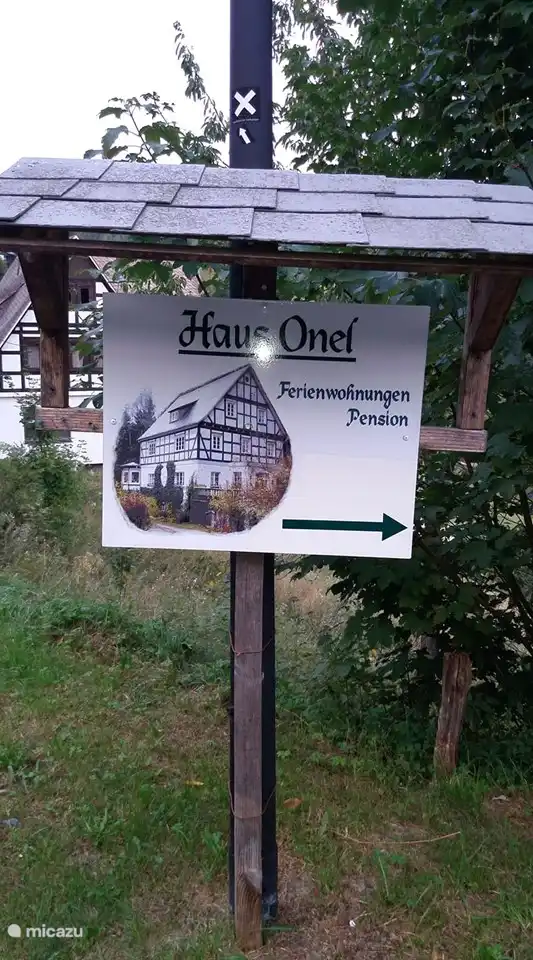 sign exit Haus Onel